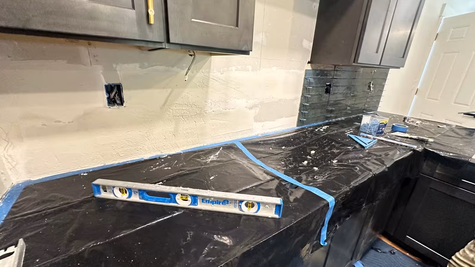 Kitchen before subway tile backsplash installation in Aurora CO